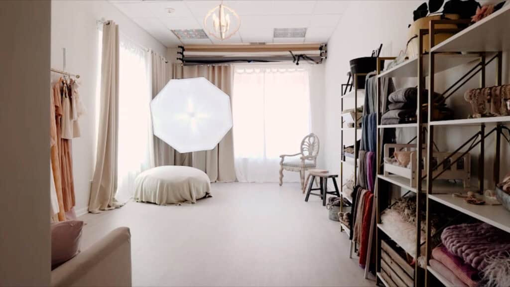 Cozy boutique with clothes and textiles on display.